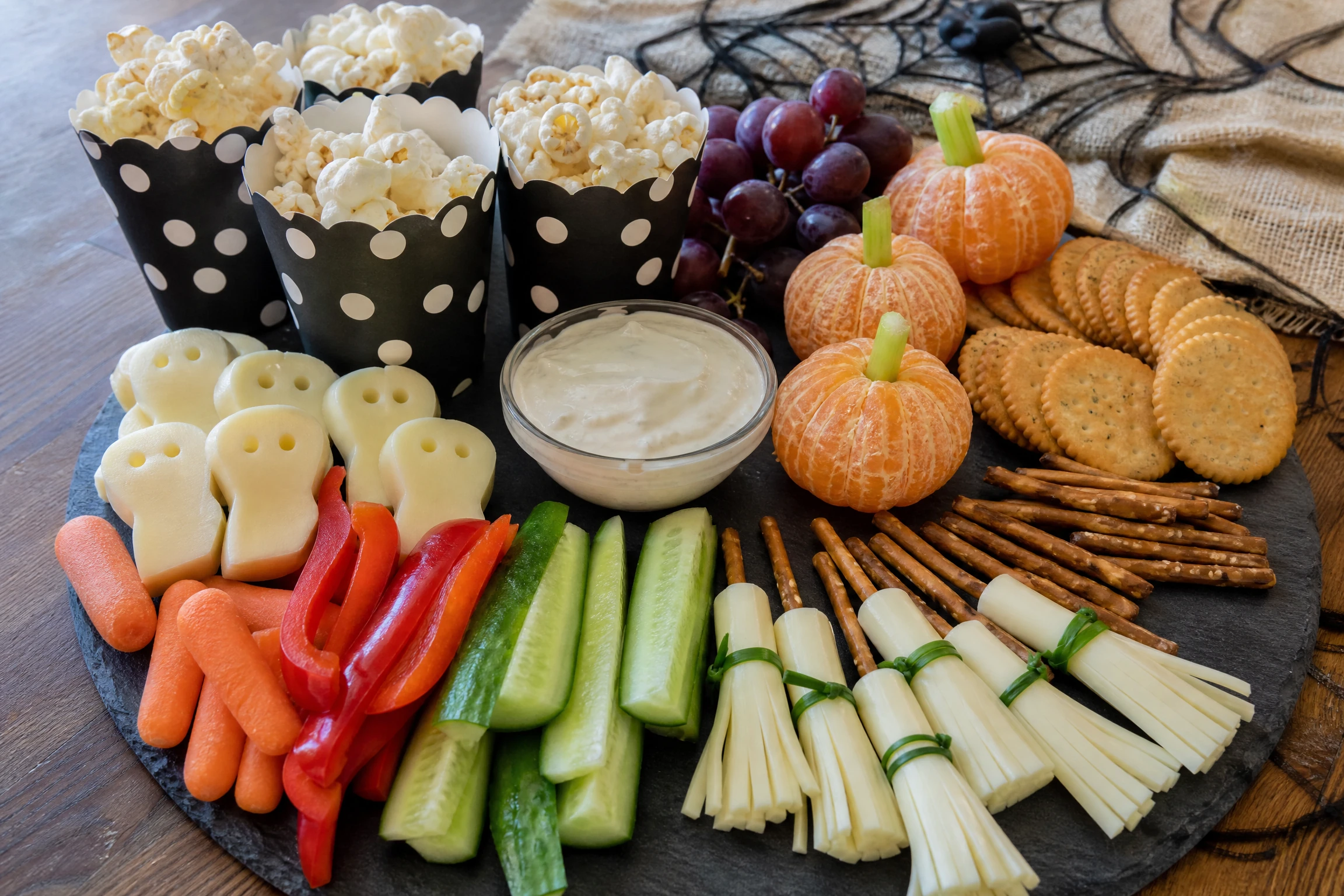 Popcorn monster cups prepared as an easy Halloween party snack